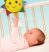 Zenélő plüss napocska - kiságyra akasztható - Baby Clementoni